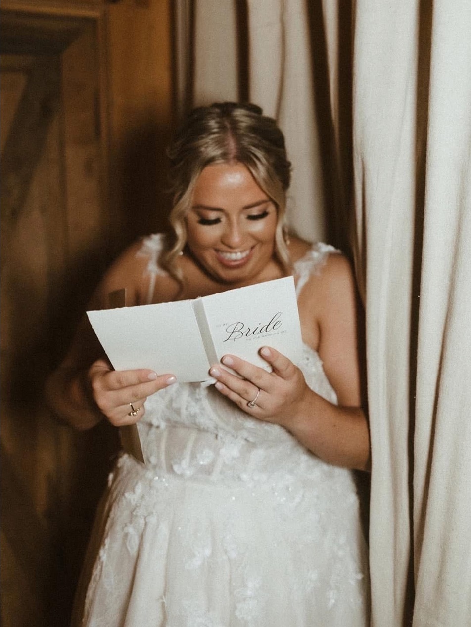 A bride reading a letter