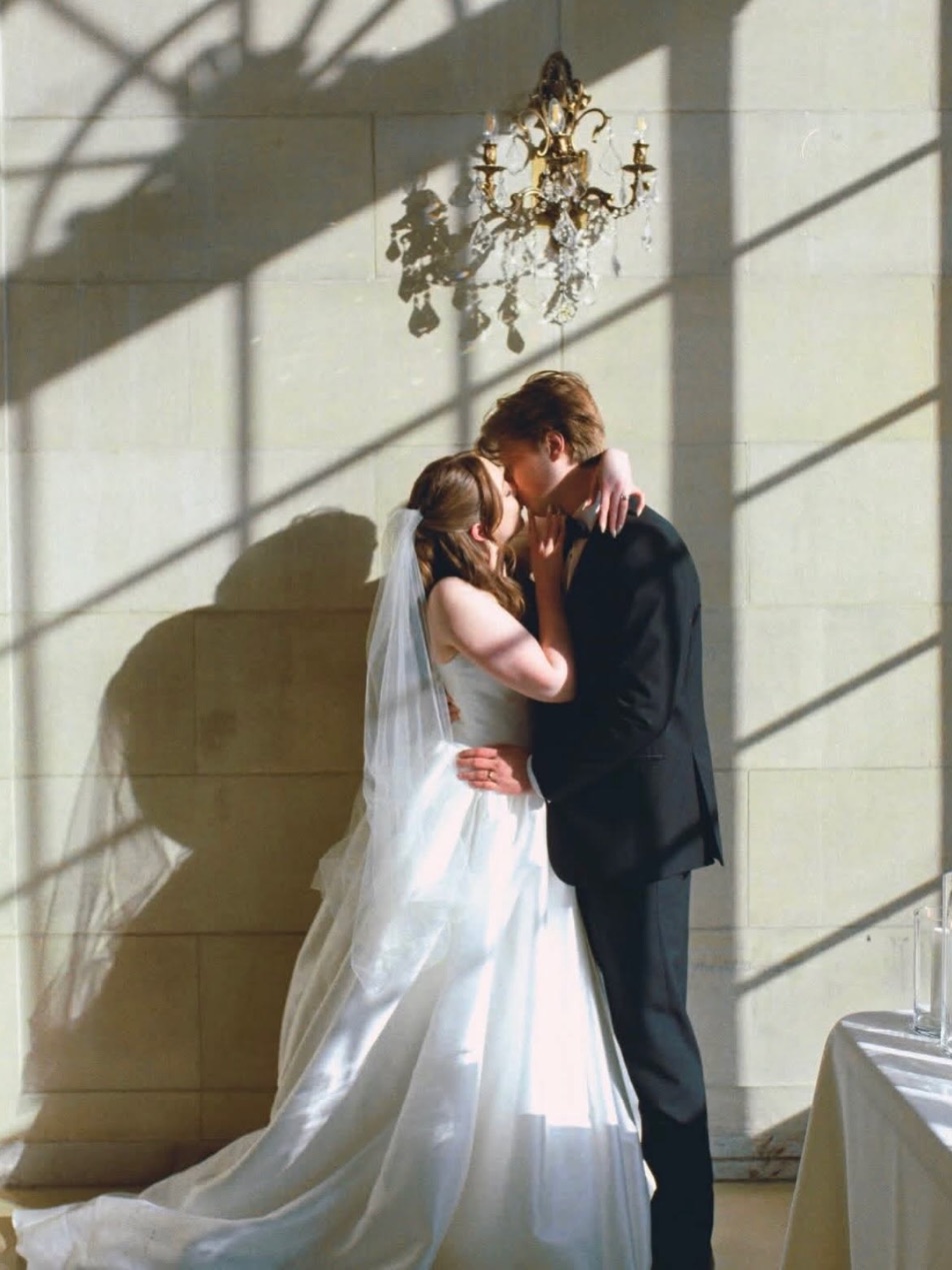 A kiss in window light